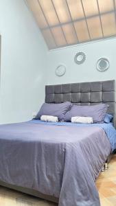 Krevet ili kreveti u jedinici u okviru objekta Hermoso Apartamento cerca al aeropuerto - My Little Home 3