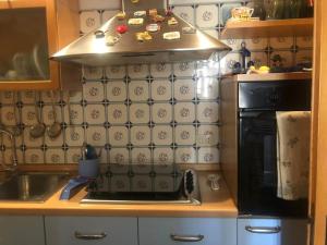 Η κουζίνα ή μικρή κουζίνα στο La Mansarda del cuore