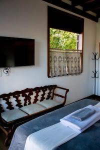 Cama ou camas em um quarto em Moã Charme Hotel - Mucugê