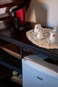 Comodidades para preparar café e chá em Moã Charme Hotel - Mucugê
