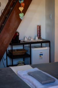 Cama ou camas em um quarto em Moã Charme Hotel - Mucugê