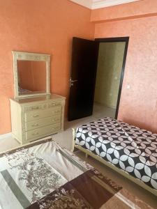 Postel nebo postele na pokoji v ubytování Appartement De Luxe A Wilaya De Tetouan