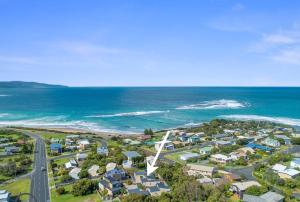 an aerial view of a suburb next to the ocean at Apollo Bay Seal Apartments in Apollo Bay