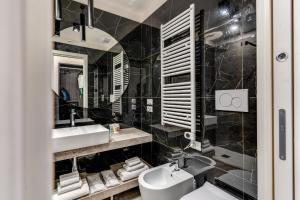 Koupelna v ubytování Arenula Suites