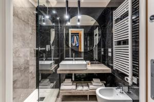 Koupelna v ubytování Arenula Suites