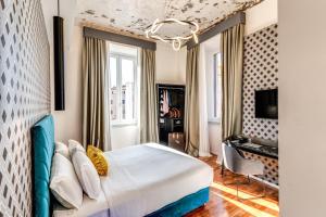 TV a/nebo společenská místnost v ubytování Arenula Suites