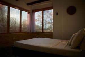 Letto o letti in una camera di Hostal Juan Palitos