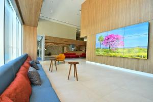 TV a/nebo společenská místnost v ubytování Holiday Inn Express Asuncion Aviadores by IHG