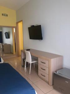 Televiisor ja/või meelelahutuskeskus majutusasutuses Hostel paradise St