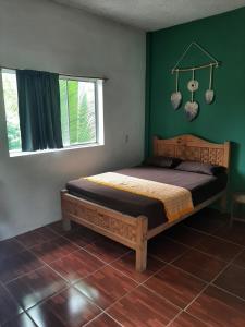 Ένα ή περισσότερα κρεβάτια σε δωμάτιο στο Casa Samay