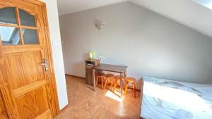 Postel nebo postele na pokoji v ubytování Pokoje Gościnne R10