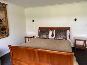 Postel nebo postele na pokoji v ubytování Te Whare Ma