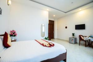 TV a/nebo společenská místnost v ubytování Tuấn An Hotel