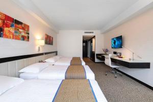 TV o dispositivi per l'intrattenimento presso Regal Riverside Hotel