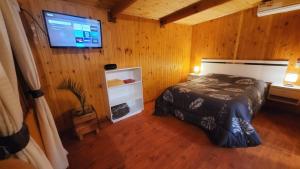 Postel nebo postele na pokoji v ubytování Cabañas Pulmahue