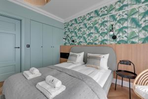 Posteľ alebo postele v izbe v ubytovaní Lion Apartments - Havana Premium Family Stay + 12 fotografií