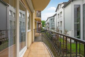a balcony of a apartment building with condos at Lion Apartments - Havana Premium Family Stay in Sopot