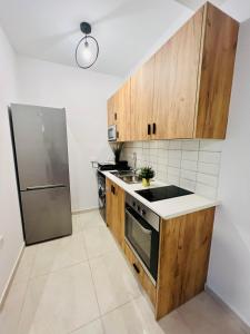 Kuchyň nebo kuchyňský kout v ubytování LINA 25