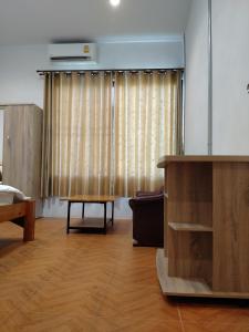 Postel nebo postele na pokoji v ubytování Sakura House