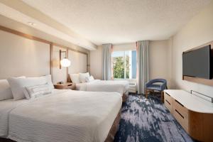 Postel nebo postele na pokoji v ubytování Fairfield Inn & Suites by Marriott Reno Sparks