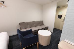 Un lugar para sentarse en Henn na Hotel Premier Nagoya Fushimiekimae