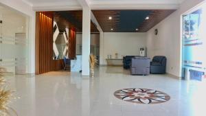 Χώρος καθιστικού στο El Malik hotel Sumenep