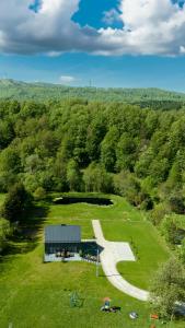 an overhead view of a building in a field with a skate park at Rezydencja Bieszczady - Solina in Solina