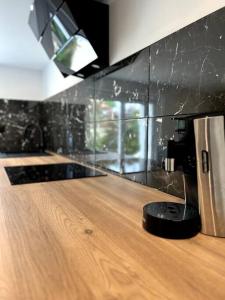 Nhà bếp/bếp nhỏ tại Suite Donatella avec accès Piscine +3 ảnh