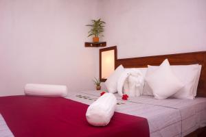 Letto o letti in una camera di Flash Rock Villa