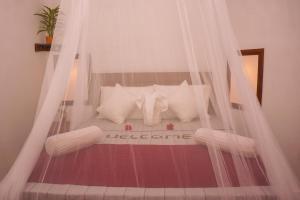 Letto o letti in una camera di Flash Rock Villa