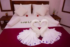 Letto o letti in una camera di Flash Rock Villa