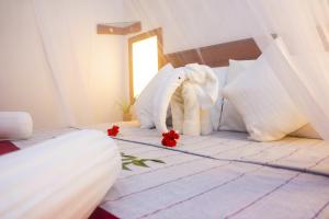 Letto o letti in una camera di Flash Rock Villa