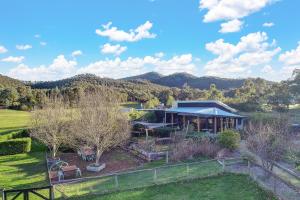 an aerial view of a house with a garden at The Sticks in Goughs Bay