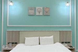 Postel nebo postele na pokoji v ubytování Sunny Ocean B&B