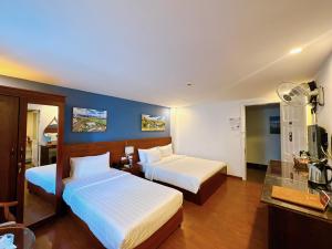 Ένα ή περισσότερα κρεβάτια σε δωμάτιο στο A25 Hotel -137 Nguyễn Du - Đà Nẵng +20 φωτογραφίες