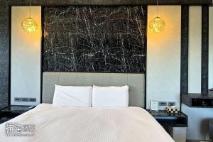 Postel nebo postele na pokoji v ubytování Sunny Ocean B&B