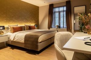Postel nebo postele na pokoji v ubytování Hotel de Boskar Houthalen
