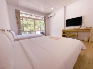 Imagem da galeria de Travel Life 源旅生活民宿 em Shuili mais 19 fotografias