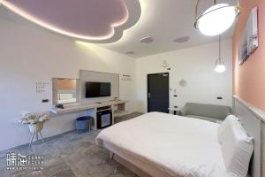 Postel nebo postele na pokoji v ubytování Sunny Ocean B&B
