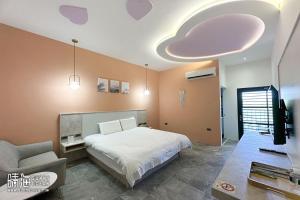 Postel nebo postele na pokoji v ubytování Sunny Ocean B&B
