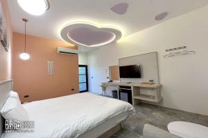 Postel nebo postele na pokoji v ubytování Sunny Ocean B&B