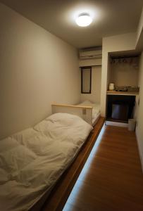 Postel nebo postele na pokoji v ubytování Hostel Belle Via Tokyo