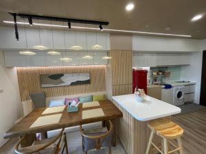 A cozinha ou kitchenette de 浮雲投影海景溫泉