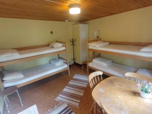 Postel nebo postele na pokoji v ubytování Selholmens Camping