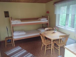 Postel nebo postele na pokoji v ubytování Selholmens Camping