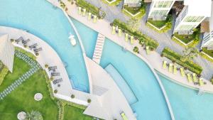 an aerial view of a pool at a resort at Vannee Golden Sands Beachfront Resort in Haad Rin