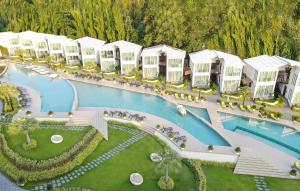 an aerial view of a resort with a swimming pool at Vannee Golden Sands Beachfront Resort in Haad Rin