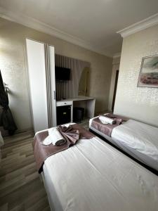 Postel nebo postele na pokoji v ubytování Divas Silver
