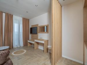 TV a/nebo společenská místnost v ubytování Hotel Diman