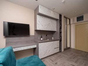 TV a/nebo společenská místnost v ubytování Hotel Diman